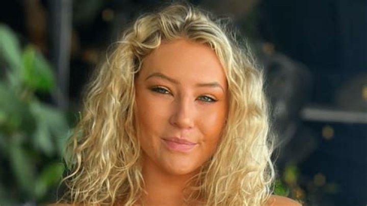 Nikkita Lyons Shares Swimsuit Video Saying "Escape the Ordinary"